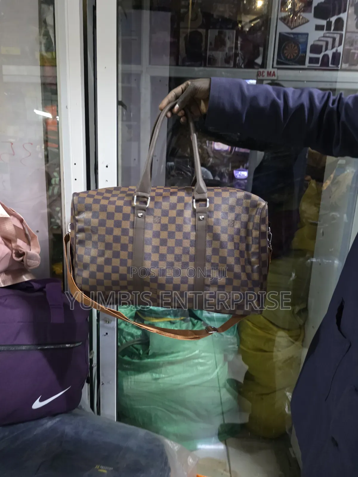 Lv Medium Travel Bags at 1200.Leather