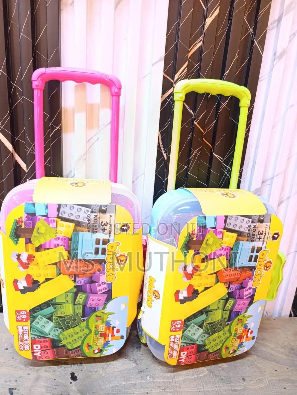 69-Piece Building Block Set With a Suitcase-Style Storage Container.