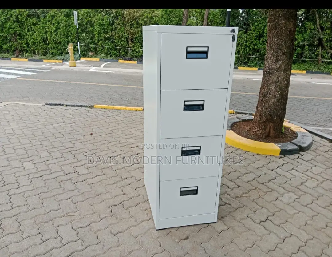 Four Drawer File Cabinets.