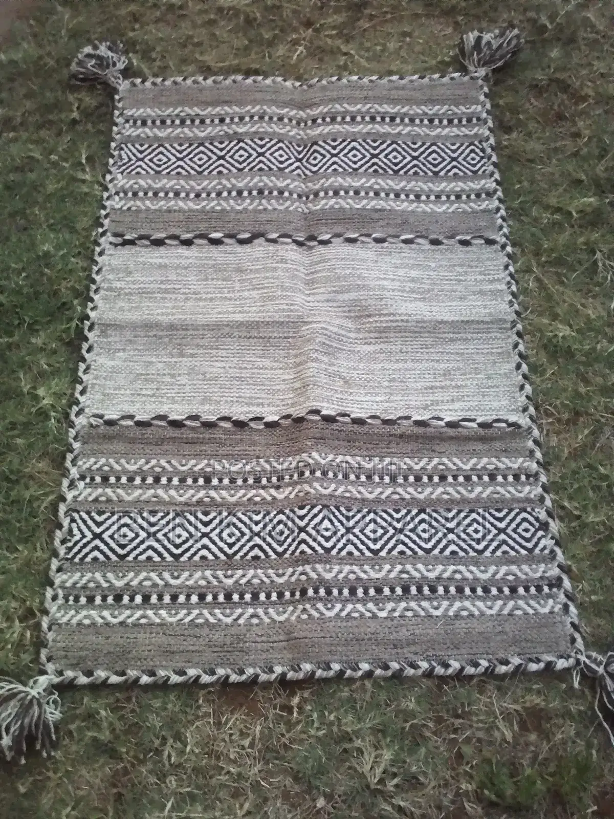 Ivory Pure Cotton Rugs 120 by 180cms