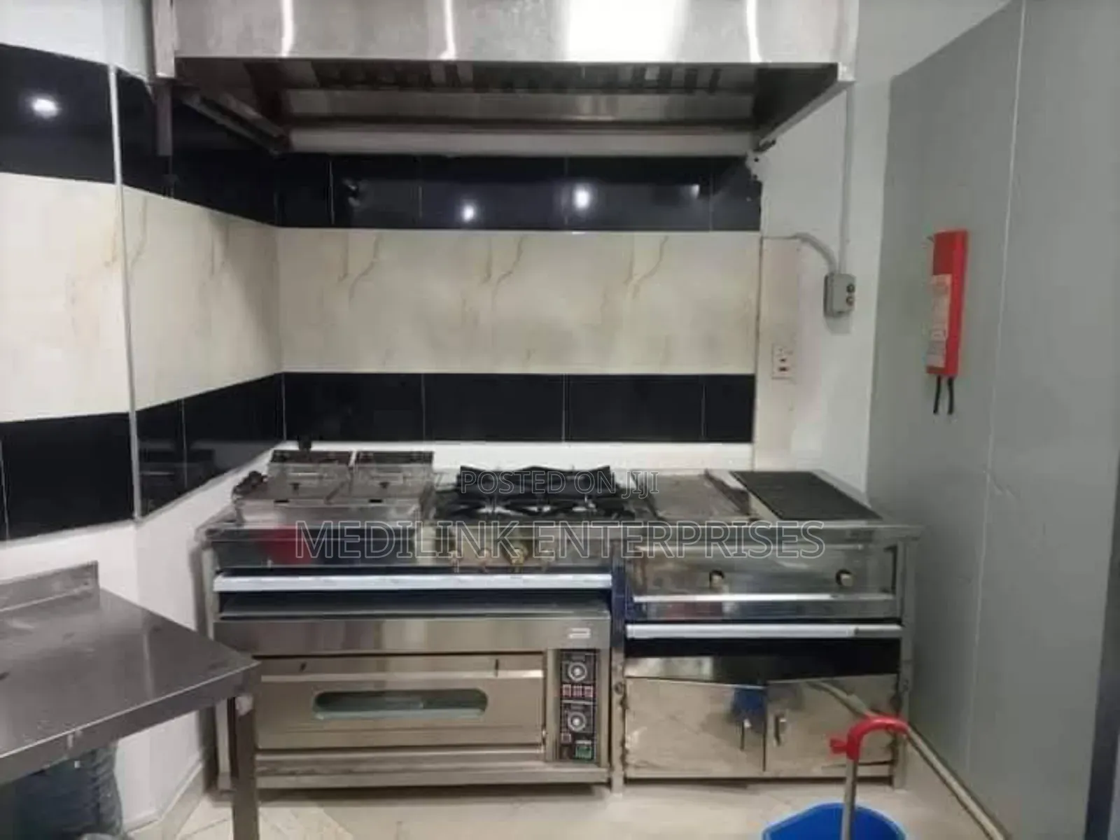 Stainless Commercial Kitchen Set Up (Burners and Hood Set Up)