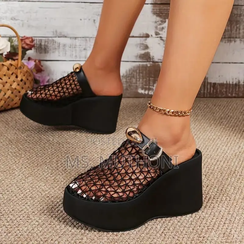Breathable Woven , Bold Sculpted Platform Sole, and a Golden Accent