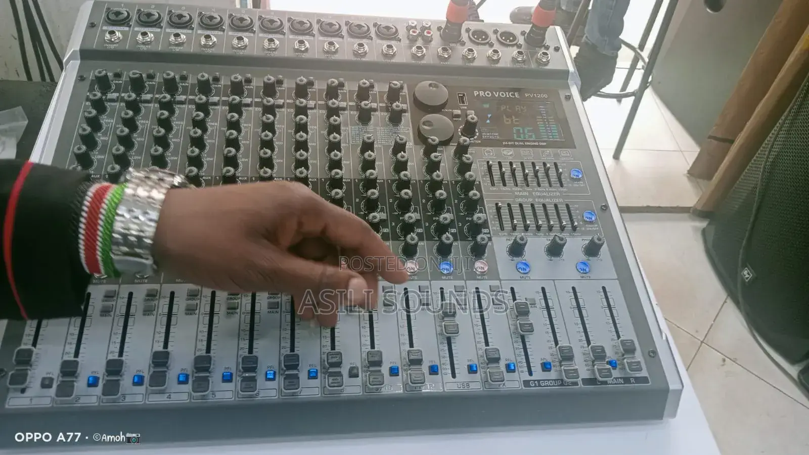 Pro Voice Pv1200, a 12-Channel Audio Mixer.