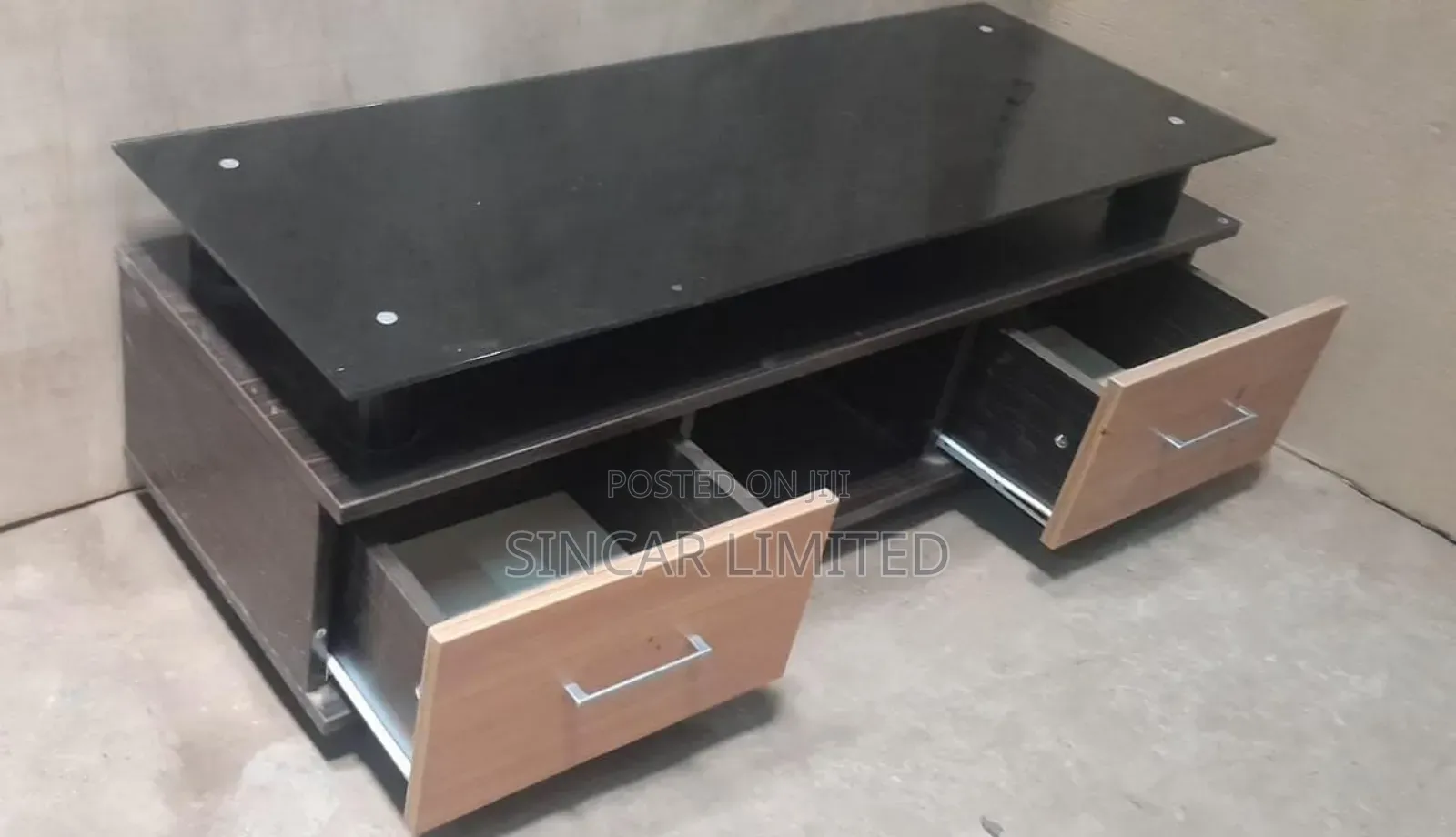 A Glass Top T.V Stand.