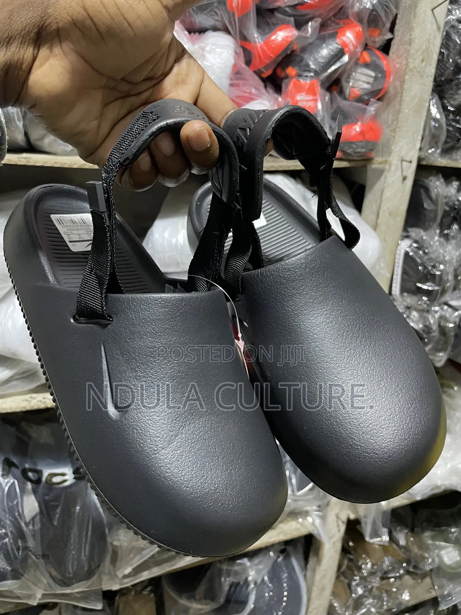 Nike Calm Mules and Slides
