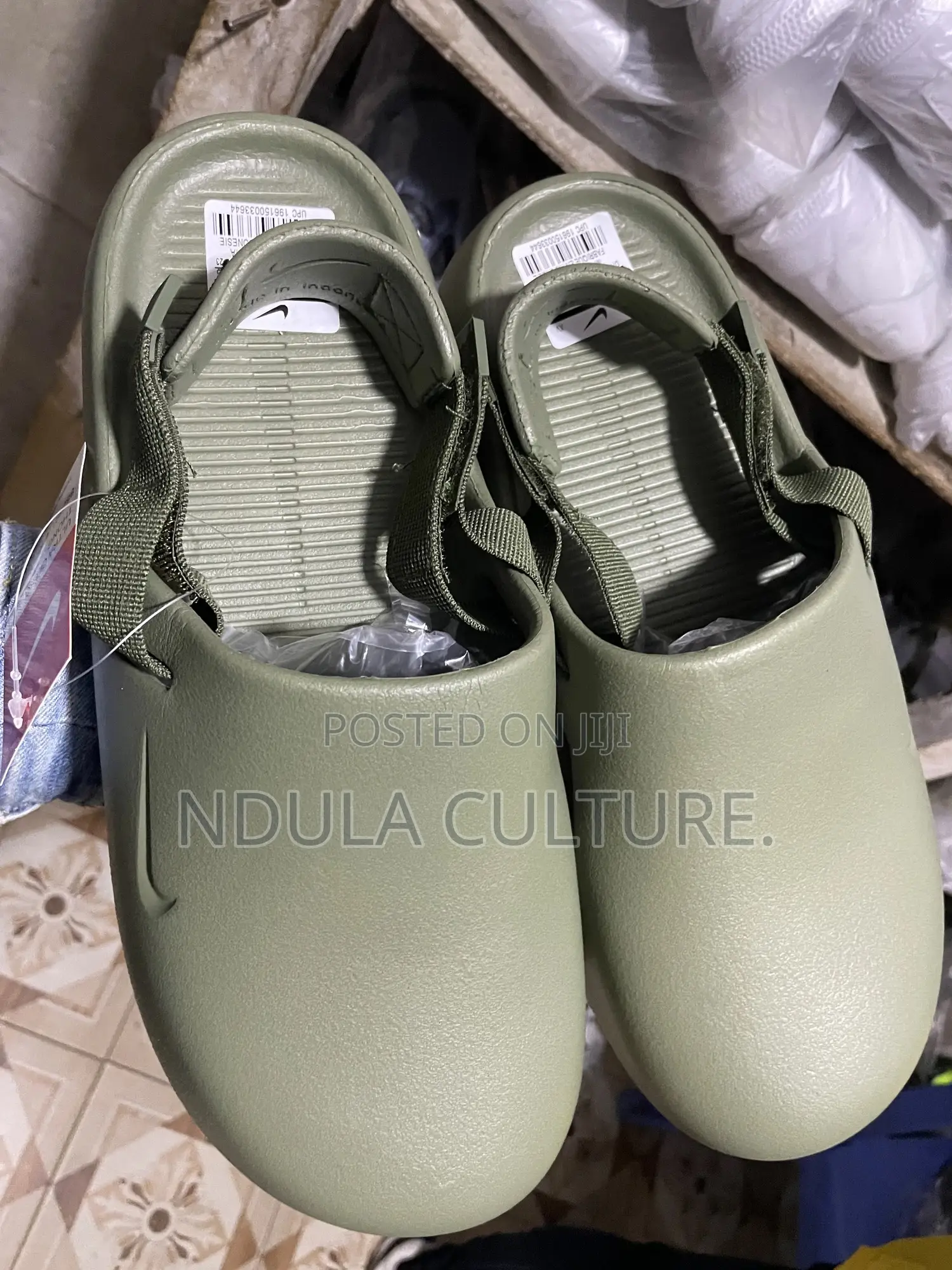 Nike Calm Mules and Slides