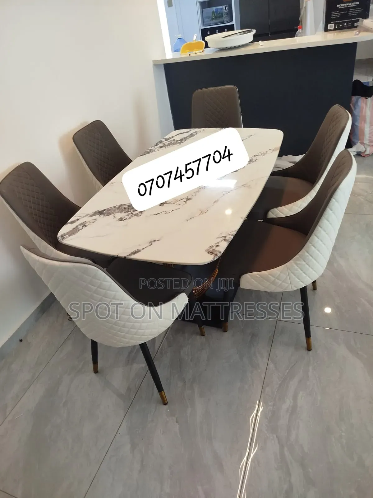 6-seater Dining Table Set - Marble Top Table With Golden Spiral Stand.