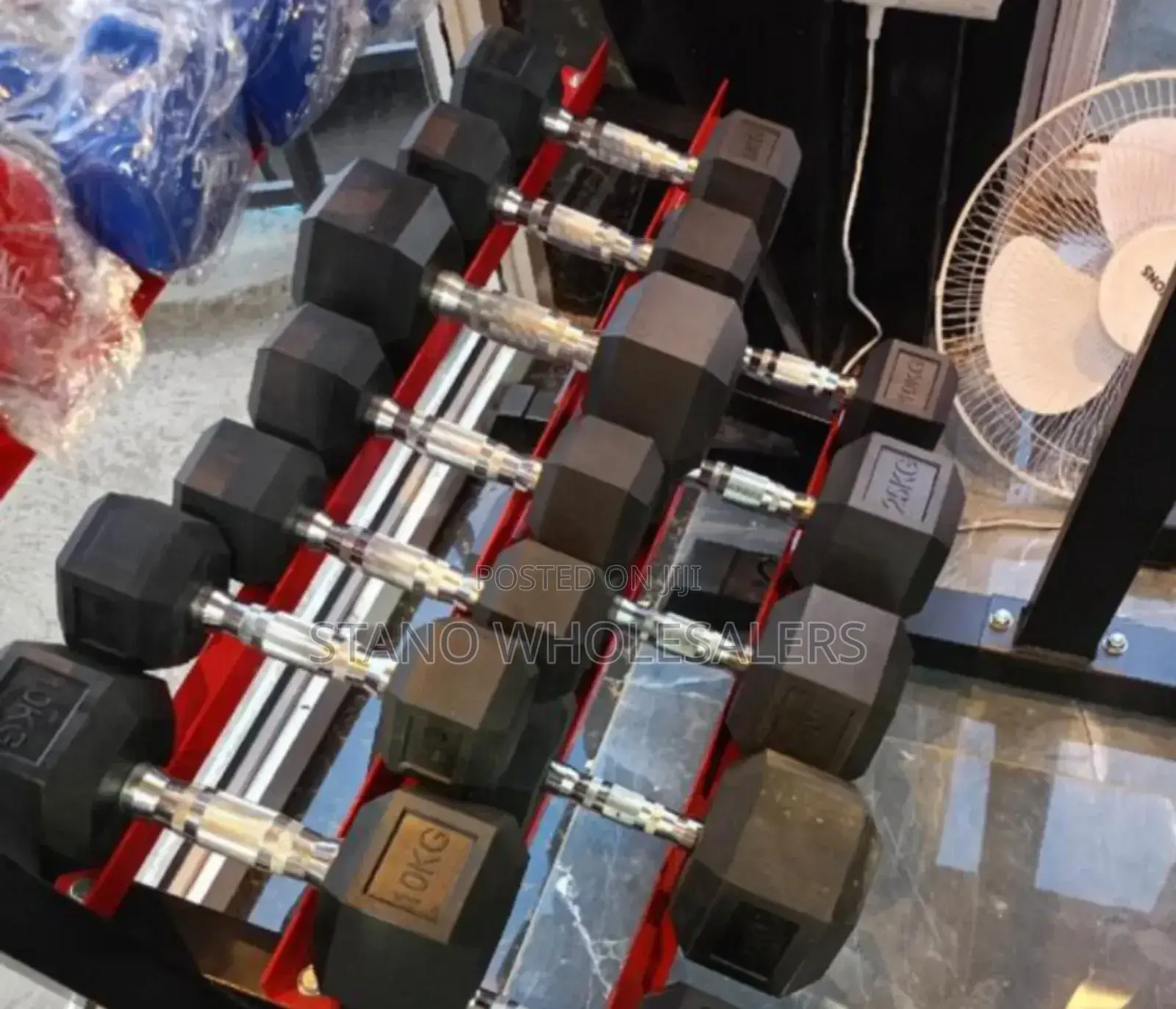 Colour Black. Rubber 25kgs Hexagonal Dumbells