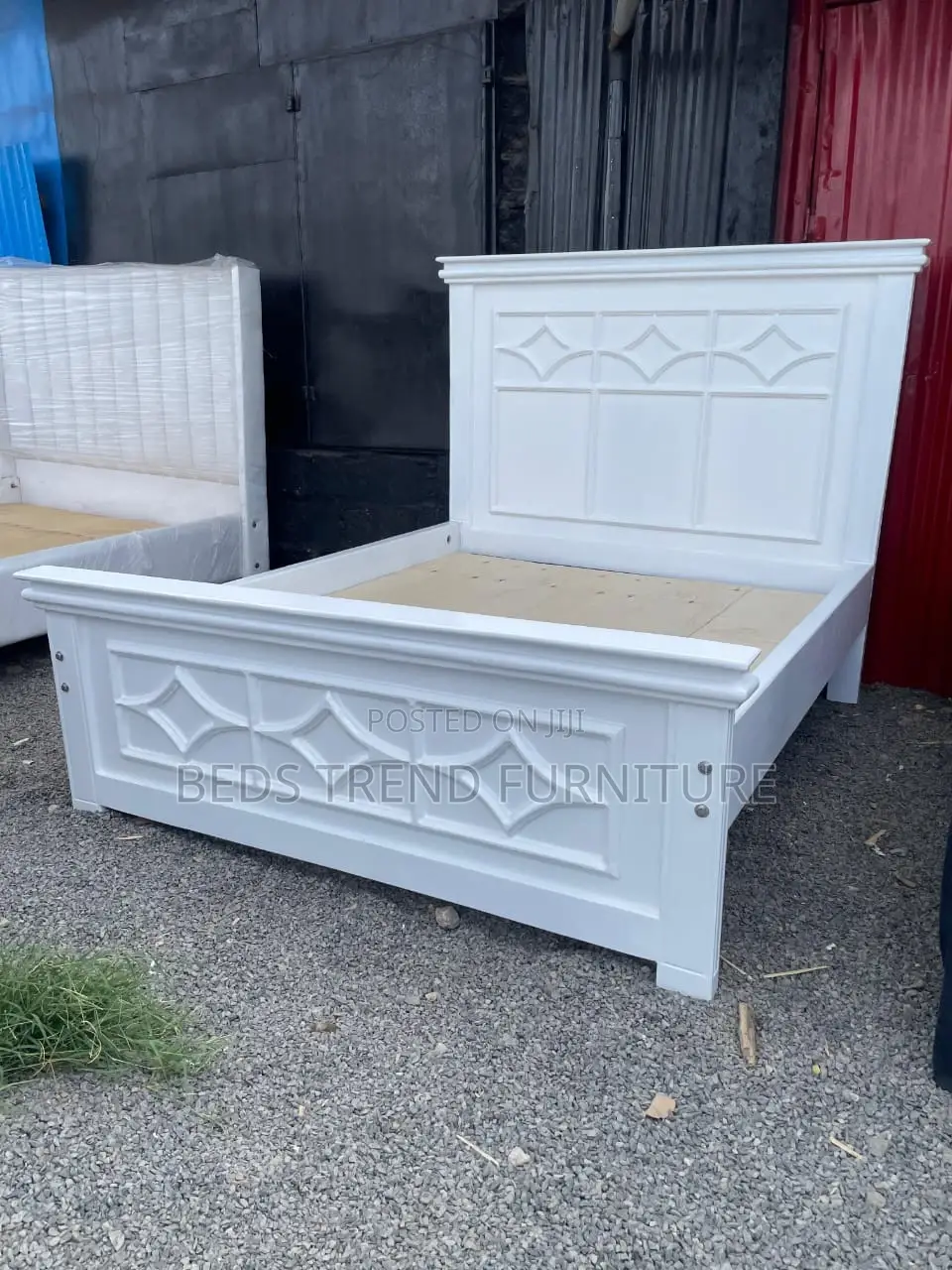 Comfy White 5 by 6 Wooden Bed