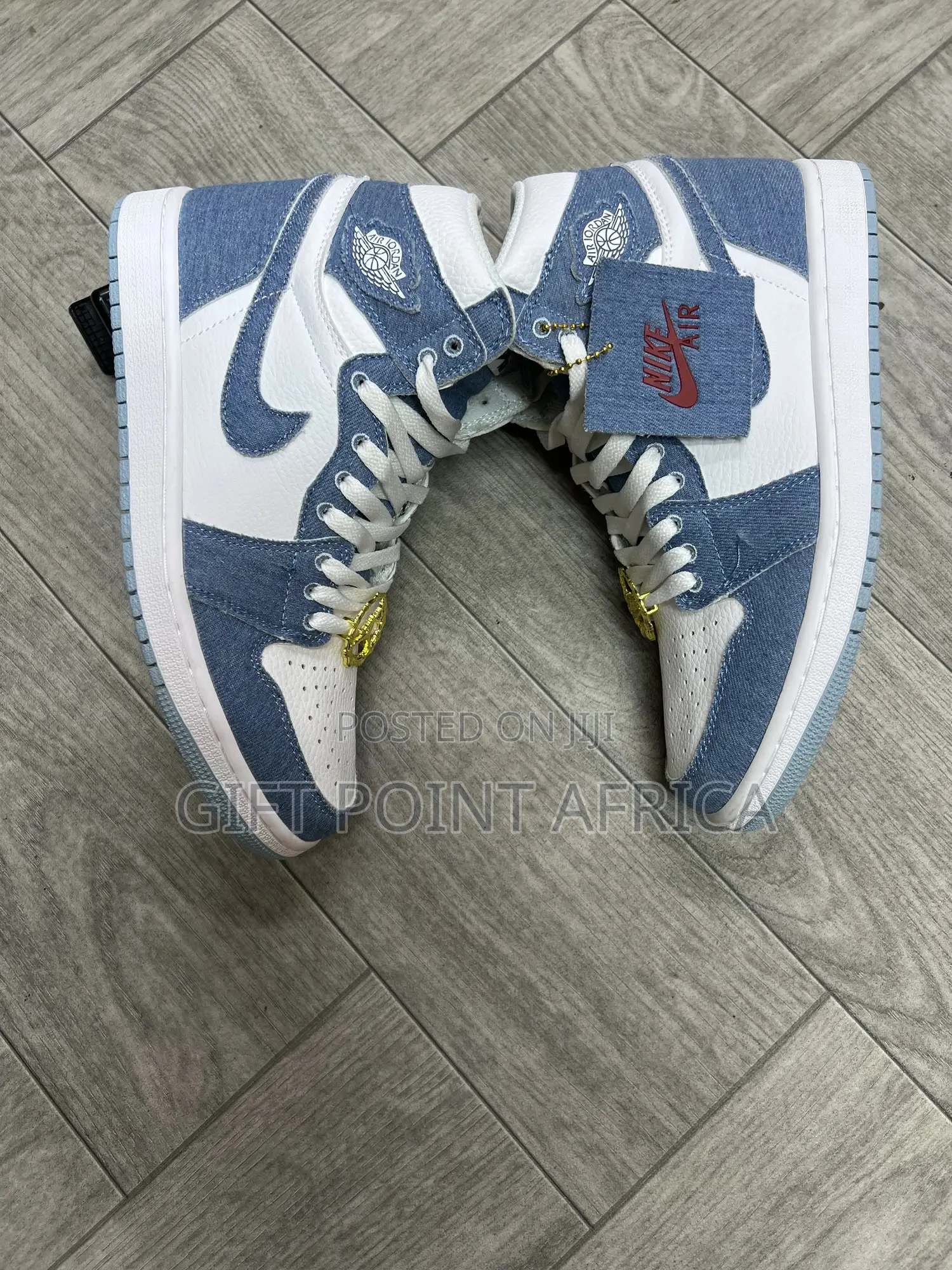 The Nike Air Jordan 1 Retro High Og 'denim' Unisex Sneaker.