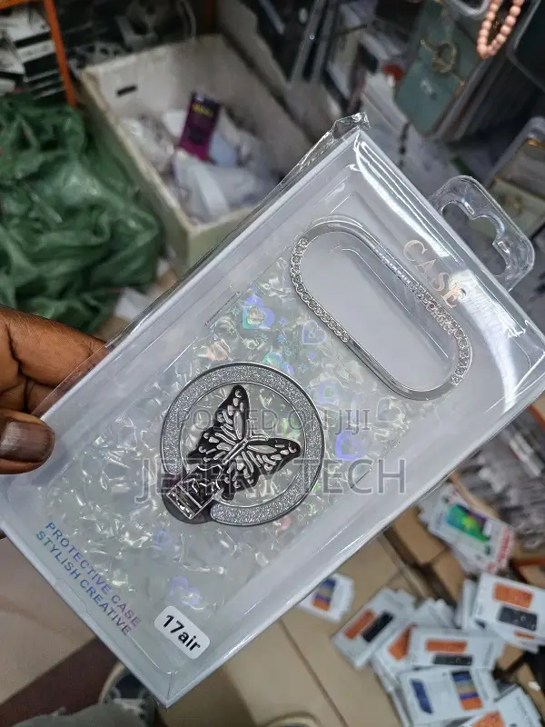 Phone Case for an iPhone 17 Air a Silver Butterfly Design and Glitter