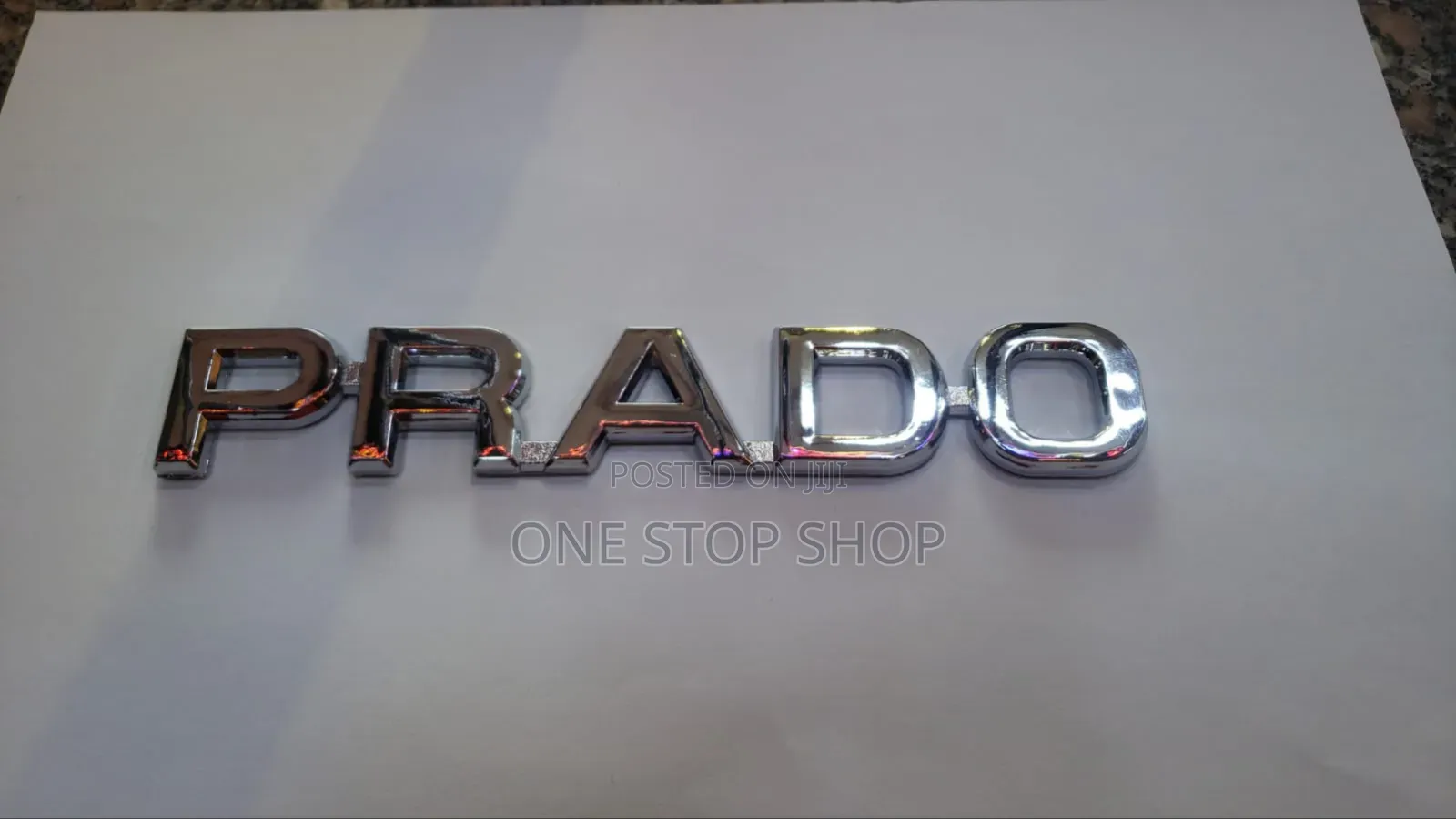 Chrome Prado Boot Letter Badge