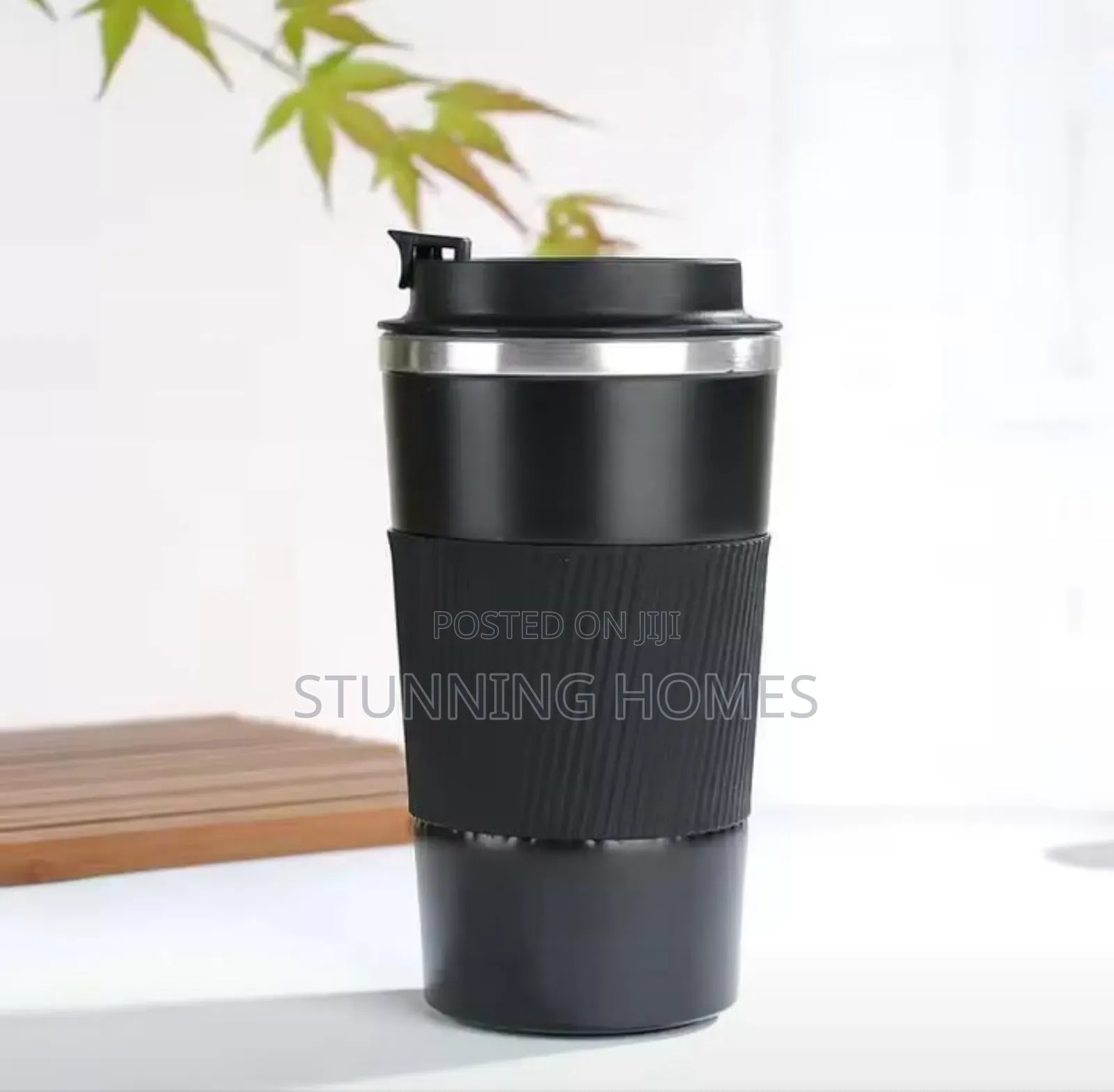 Travel Vacuum Tumbler With a Lid