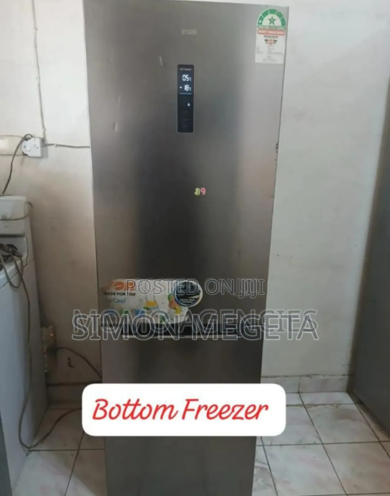 Colour Grey New Roch 334litres Fridge. +Bottom Freezers