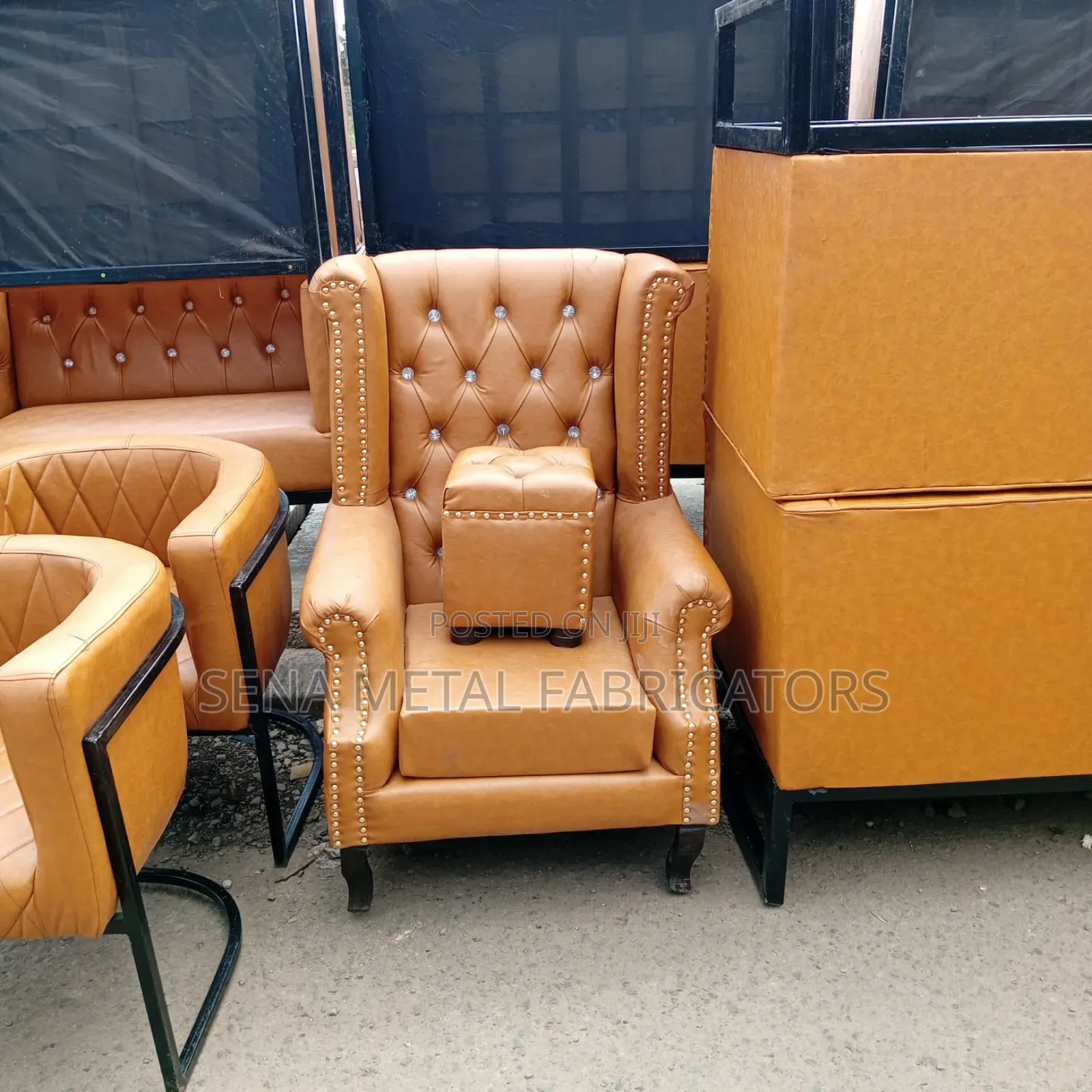 Salon King-Size Chair With Brown Pouf.