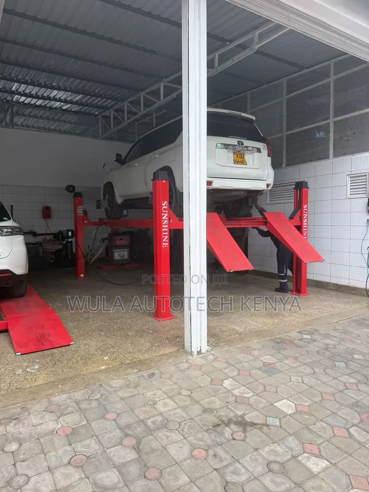Heavy Duty 4tns Four Post Vehicle Lift Machine Sunshine Wula
