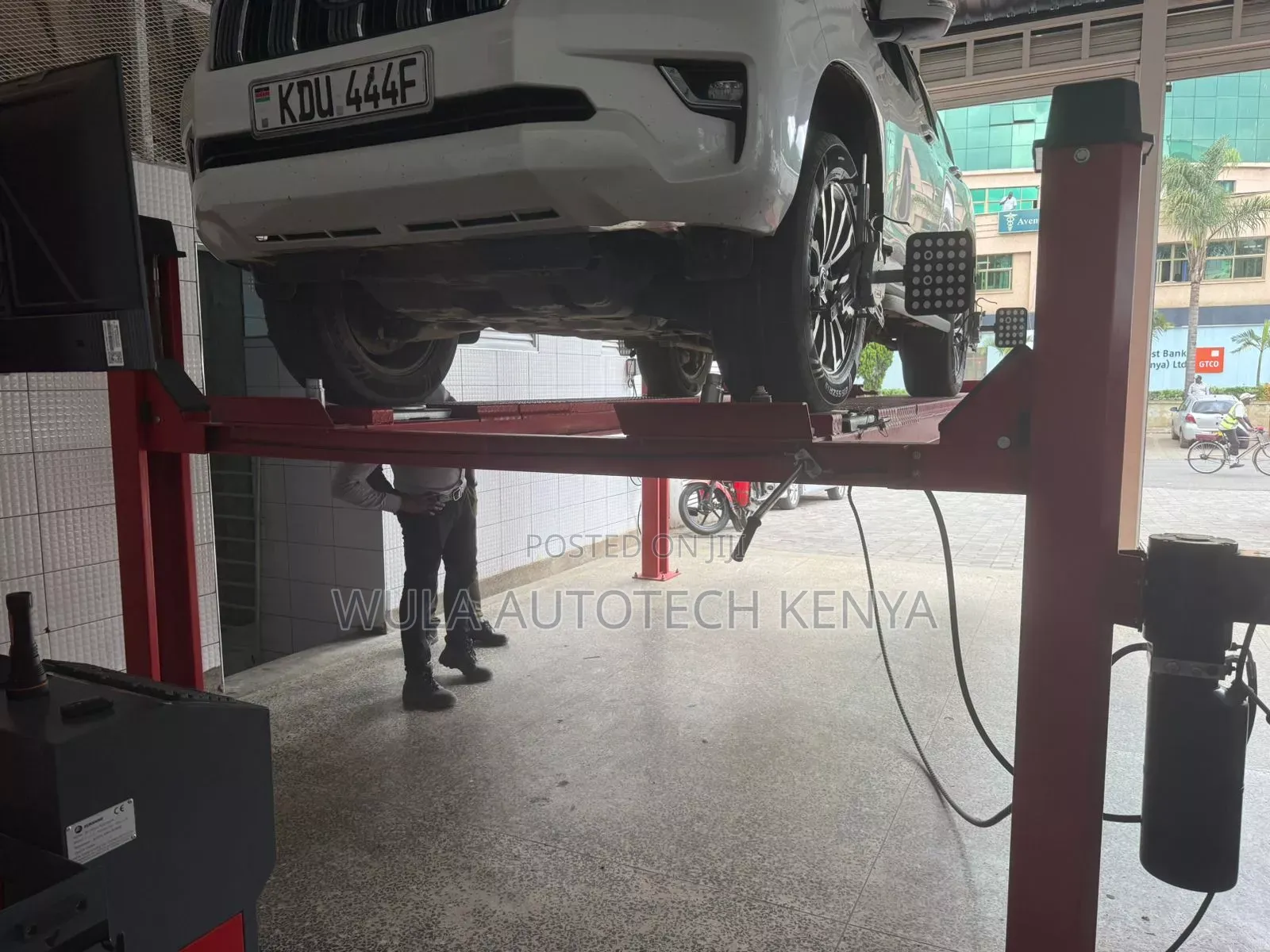 Sunshine Heavy Duty Machinery Four Post Vehicle Lift Machine