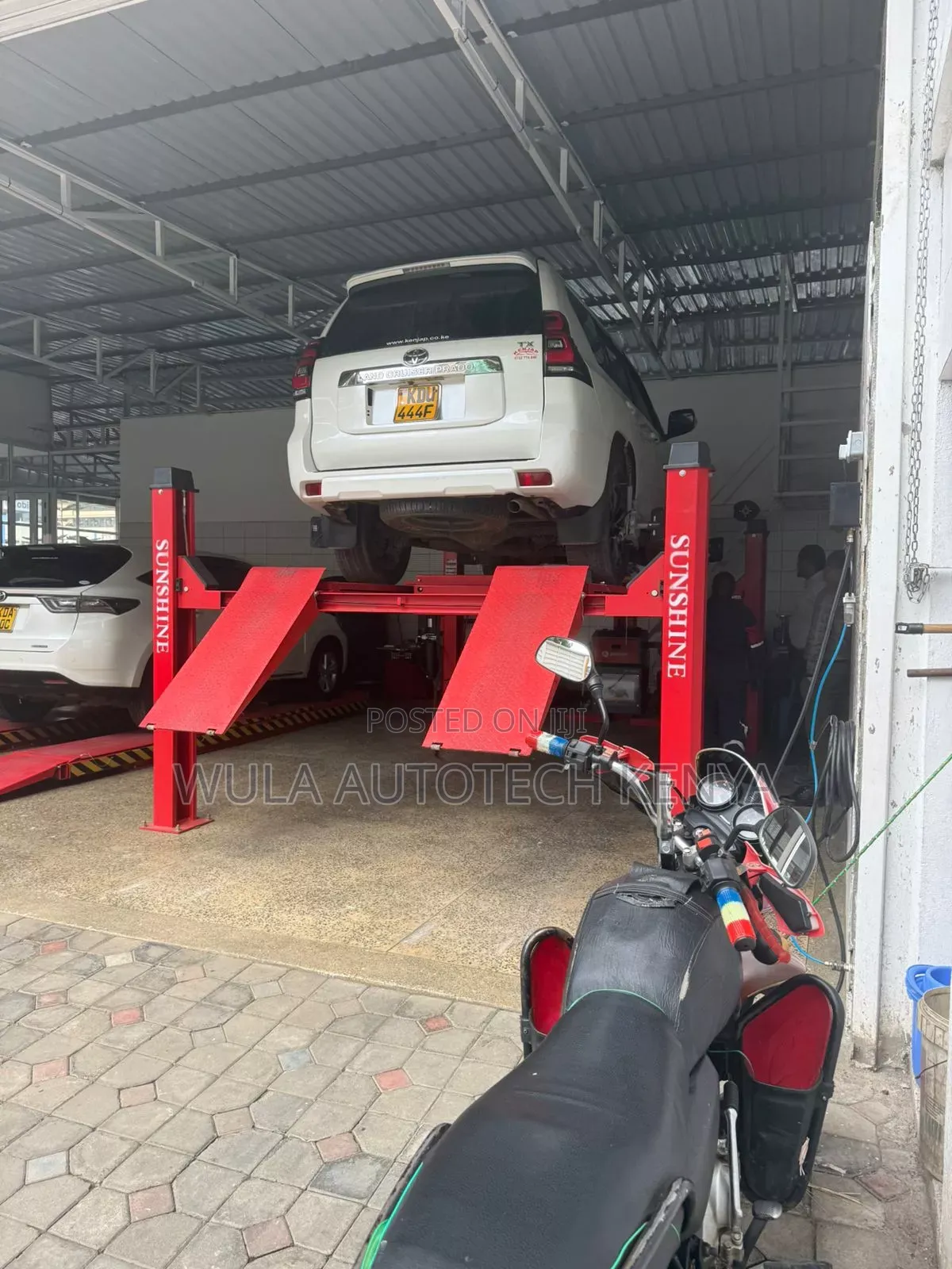 Sunshine Heavy Duty Machinery Four Post Vehicle Lift Machine