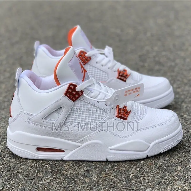 Brabd New Nike Air Jordan 4 Retro 'Red Metallic'.