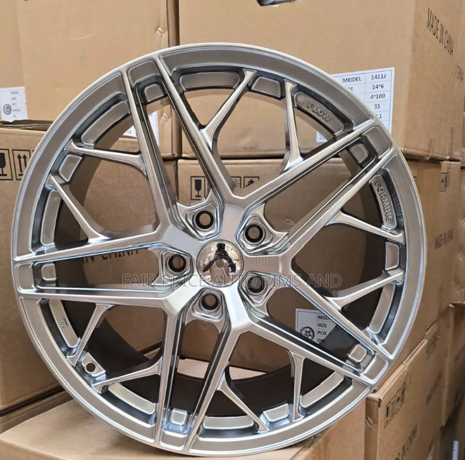 Size 18 Gunmetal And Silver Sports Rims.