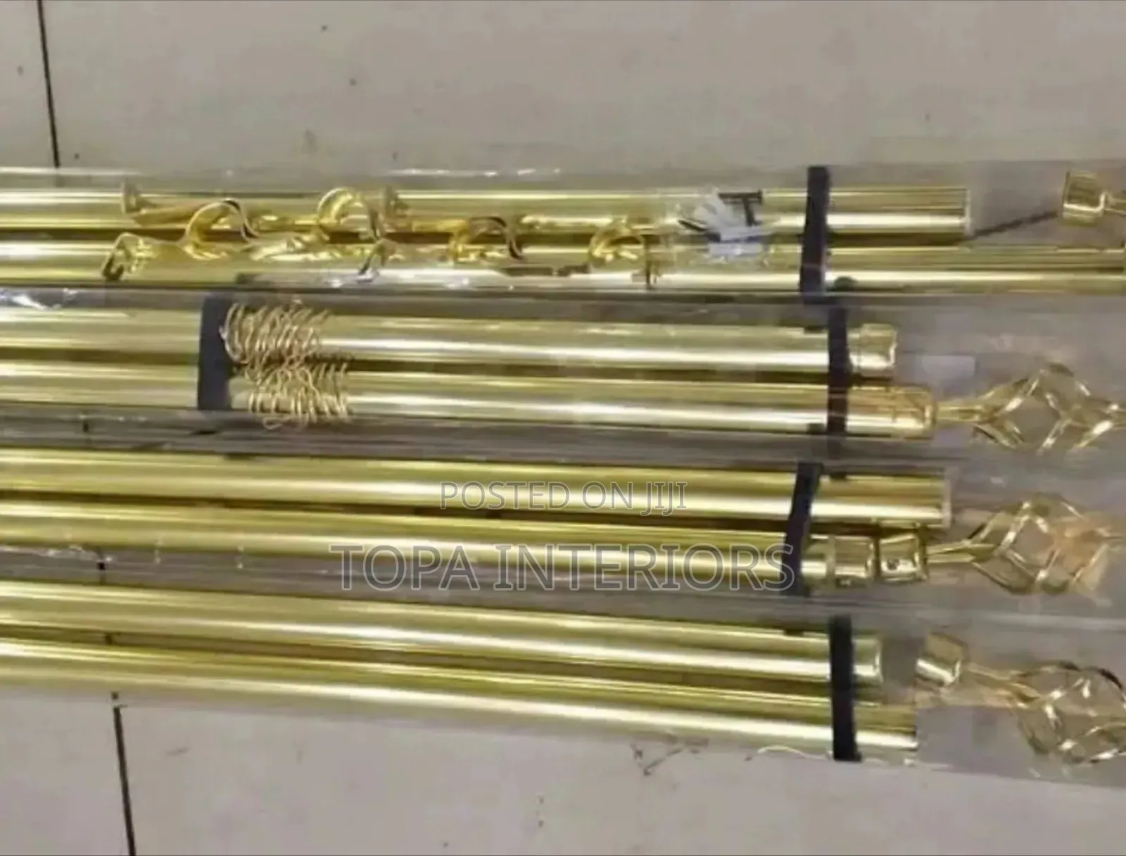 Gold Curtain Rods That Adjust Depending on the Size of the Window