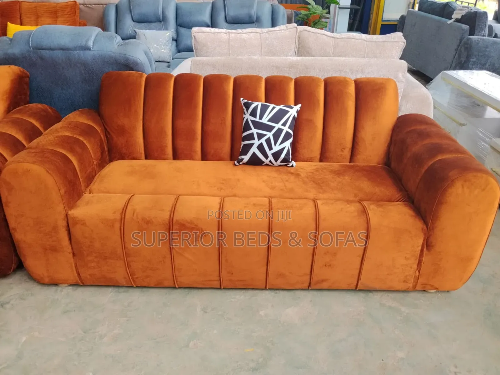 Brand New Orange 3 Seater Sofa.