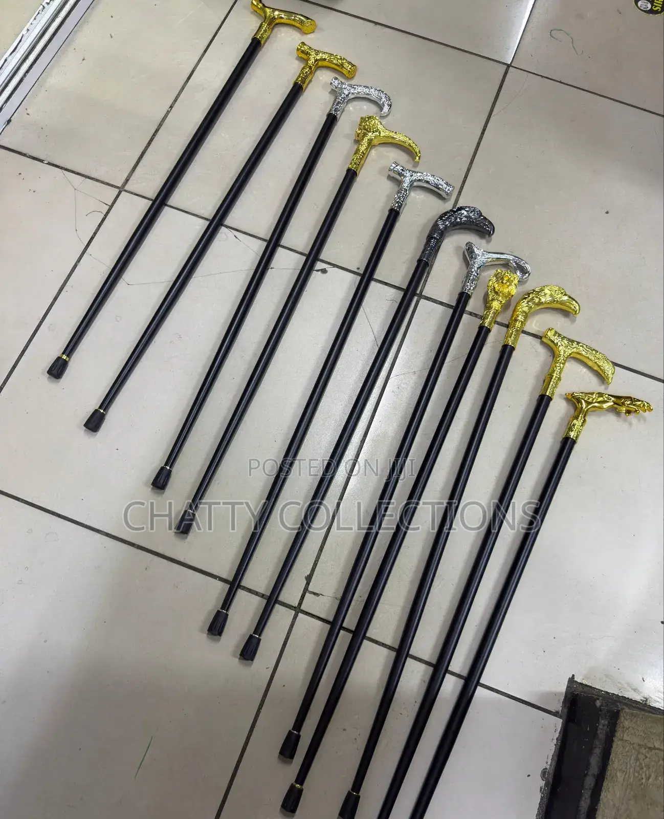 Stylish Pimped Walking Sticks 
With Sword 
Golden/Silver Handle