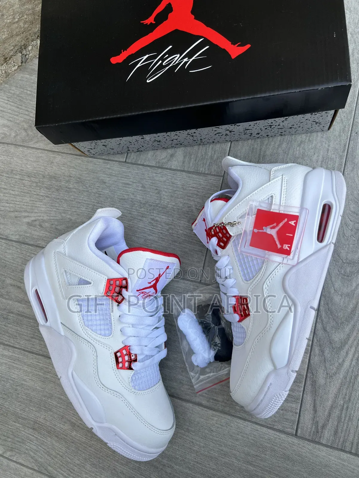 Nike Air Jordan 4 Retro Metallic Red, a Sneaker