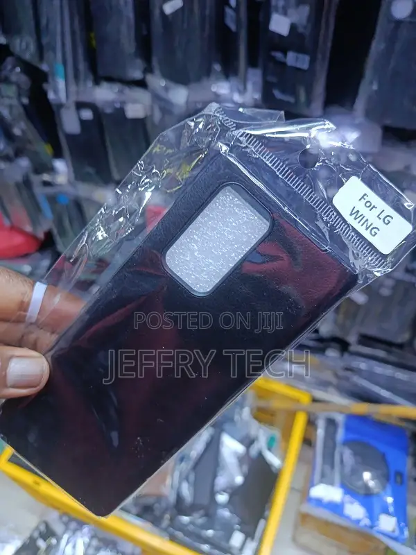 Black Leather-Style Flip Case Is Designed for the Lg Wing Phone.