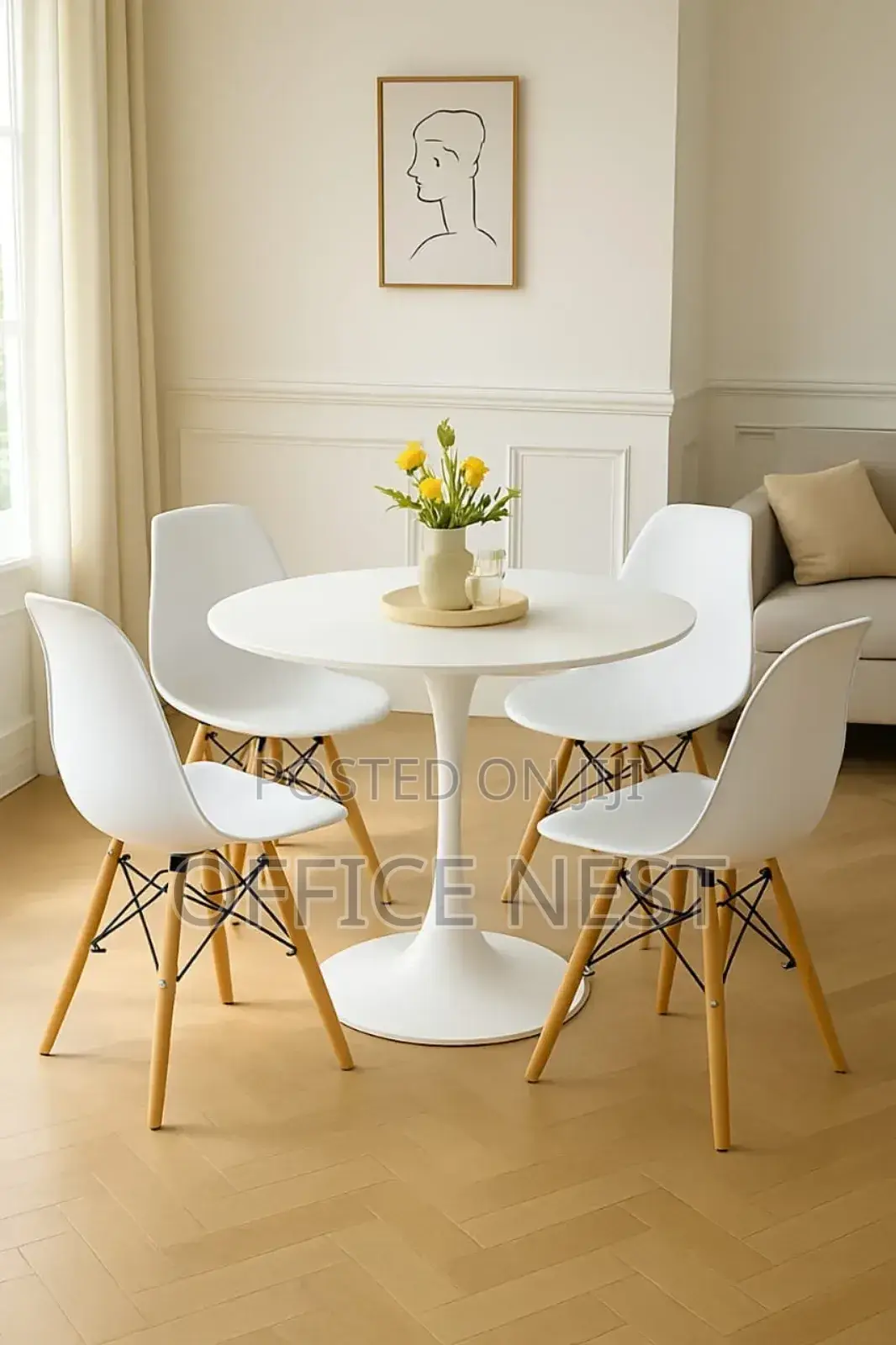 4 Seater Round Dining Table With Eames Chairs