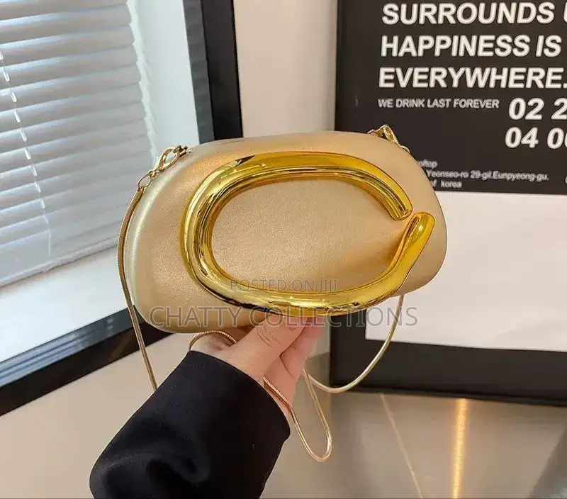 Gold Ladies Clutch Bags With Sling
