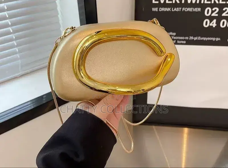 Gold Ladies Clutch Bags With Sling