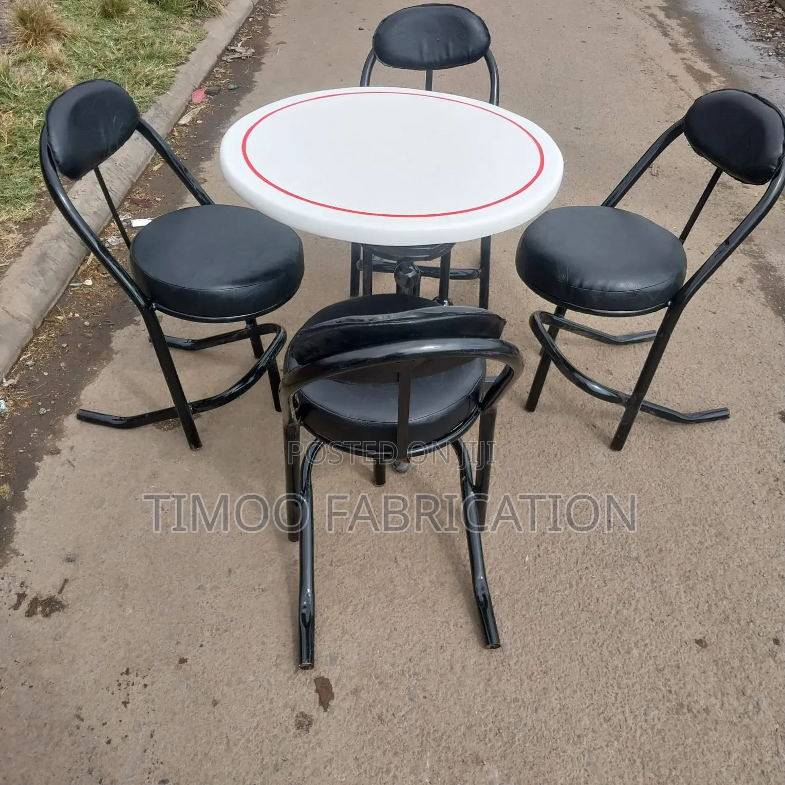 Restaurant Table With 4 Black Seats