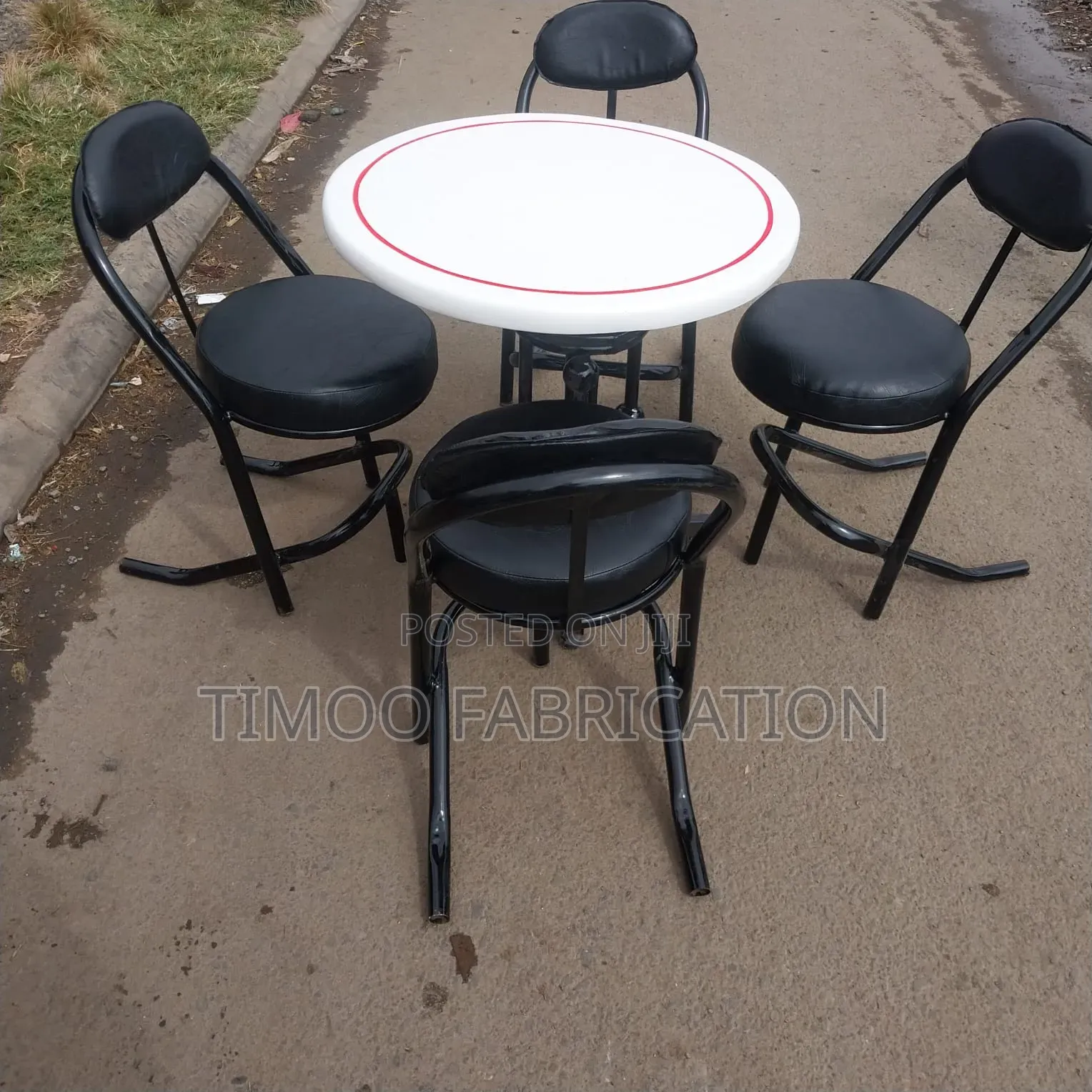 Restaurant Table With 4 Black Seats
