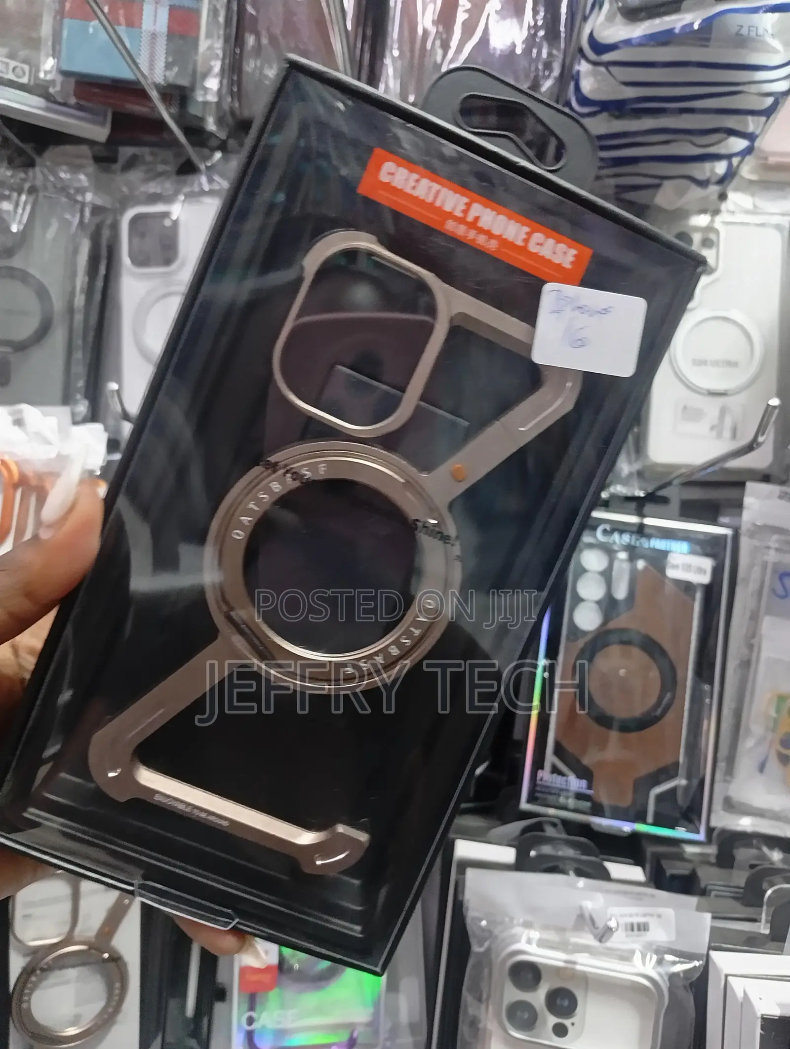 Oatsbasf Z-Shaped Titanium Metal Phone Case for the iPhone 16 Pro.