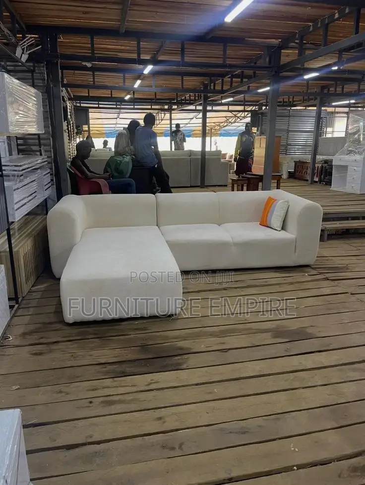 Light Beige Sectional Sofa With Accent Pillow