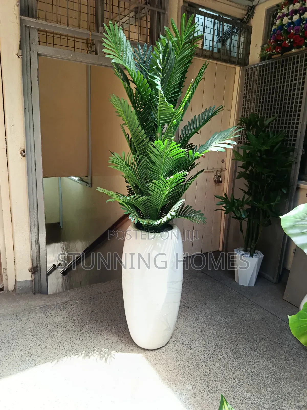 Artificial Plant With a Fiber Glass Vase