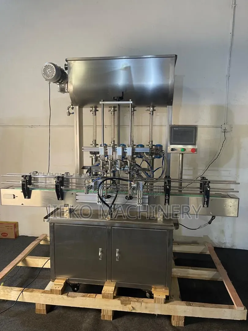 4 Nozzle Liquid Filling Machine | Automatic Bottle Filling Equipment