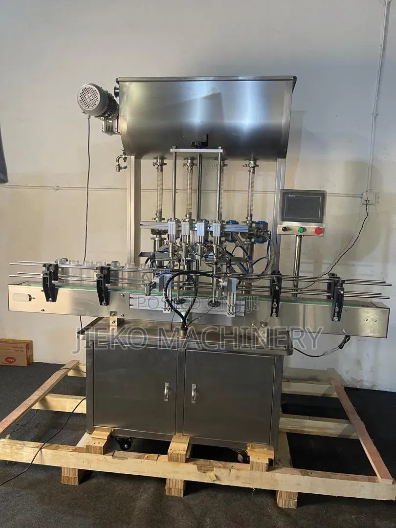 4 Nozzle Liquid Filling Machine | Automatic Bottle Filling Equipment