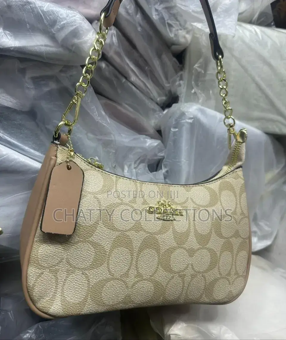 Beige Ladies Leather Coach Bags With Adjustable Shoulder Strap