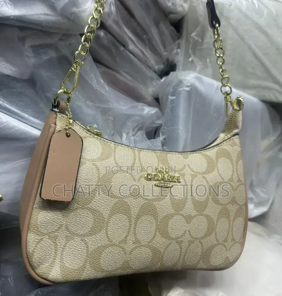 Beige Ladies Leather Coach Bags With Adjustable Shoulder Strap