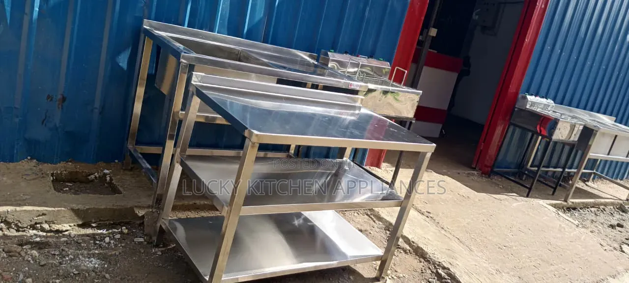 Stainless Steel Warking Top With Under Shelves.