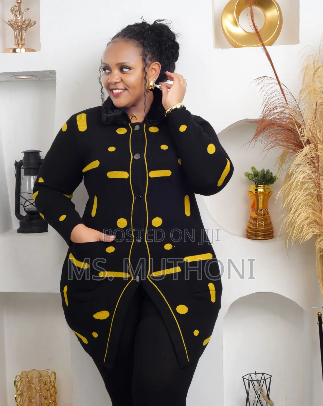 Patterned Long-Sleeved Cardigan With a Fur-Trimmed Collar.