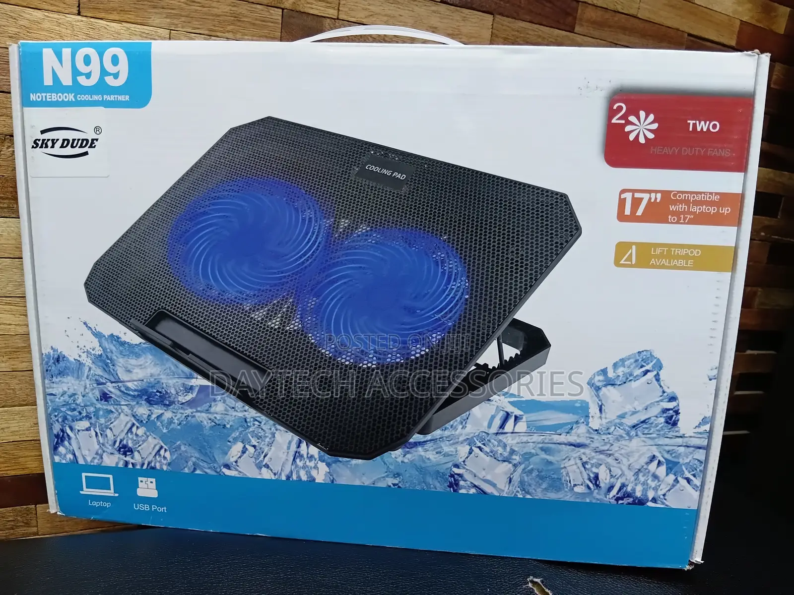 N99 Laptop Cooling Pad With Blue Led Fans and a Metal Mesh Surface.