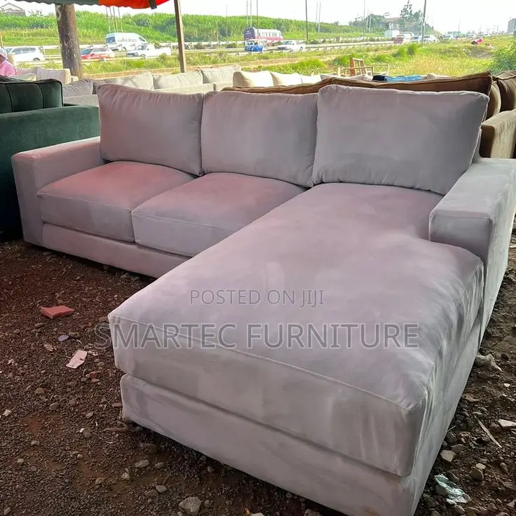 6 Seater Beige L- Seat Sofa.
