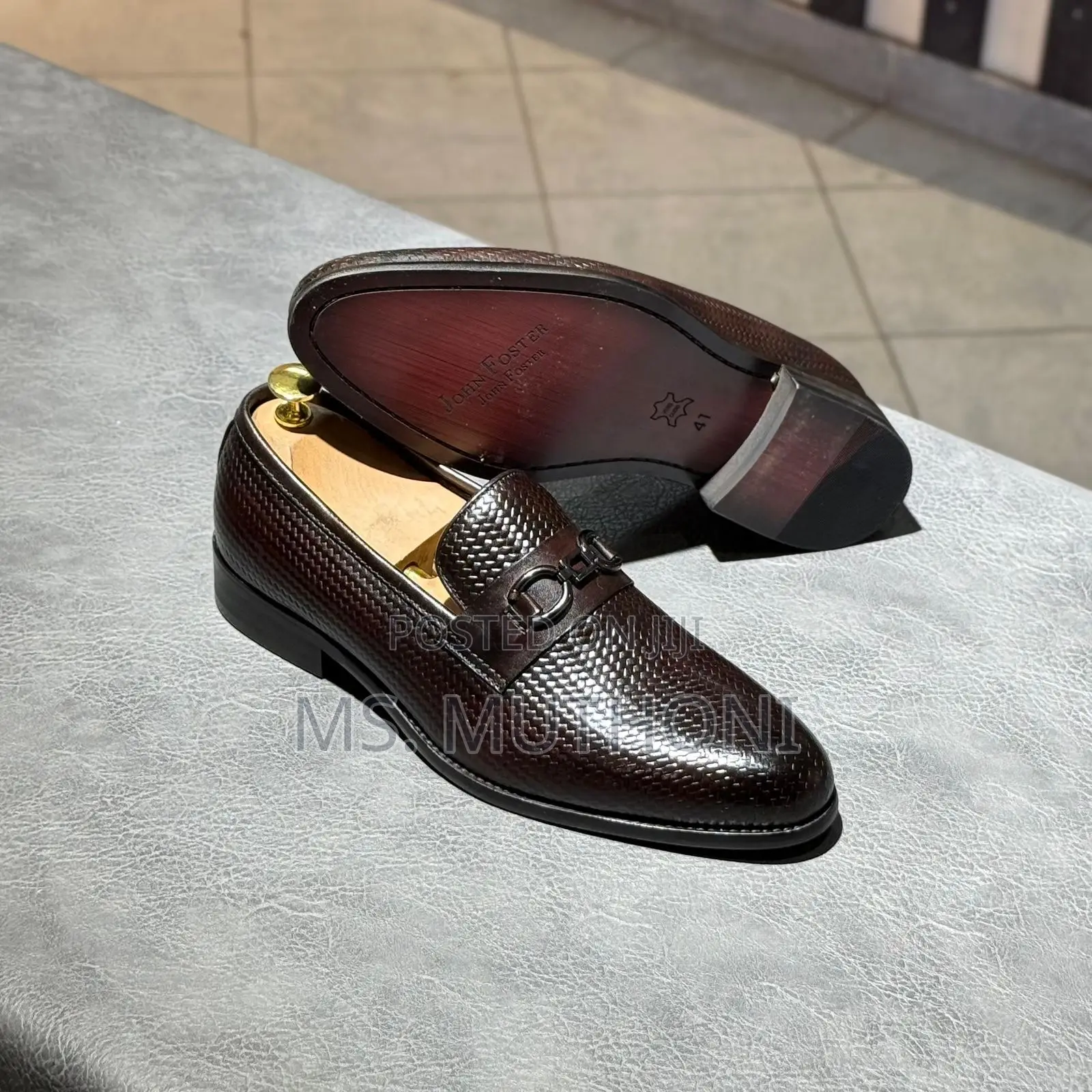 John Foster Black Textured Leather Loafers With a Horsebit Detail.