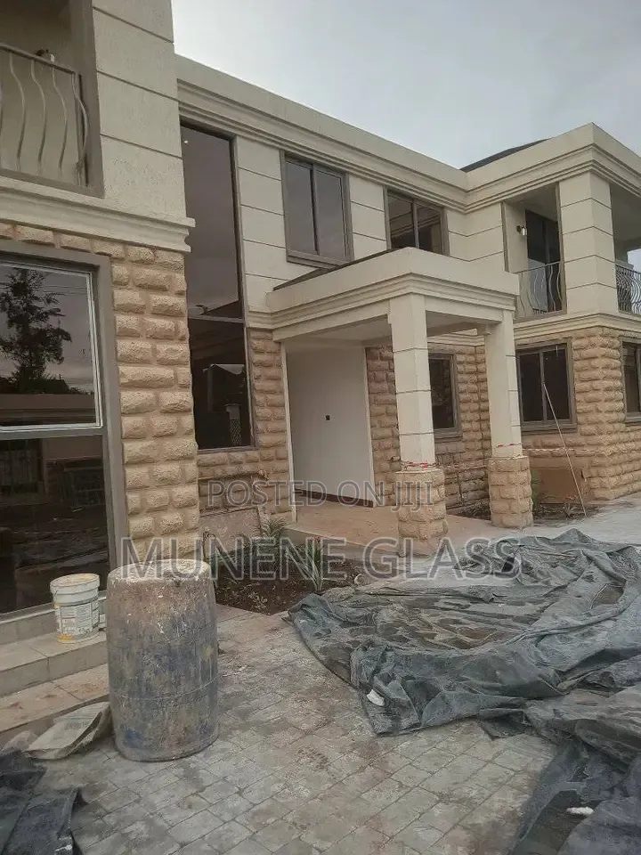 Brown Aluminium Windows With Tinted Glass