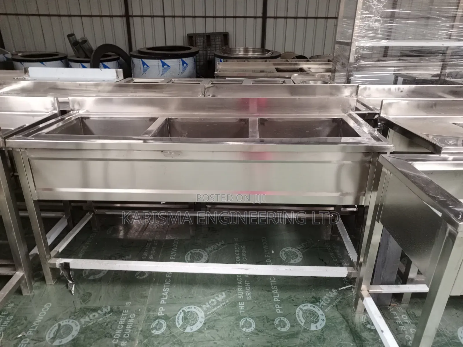 Commercial Stainless Steel Triple Sinks.