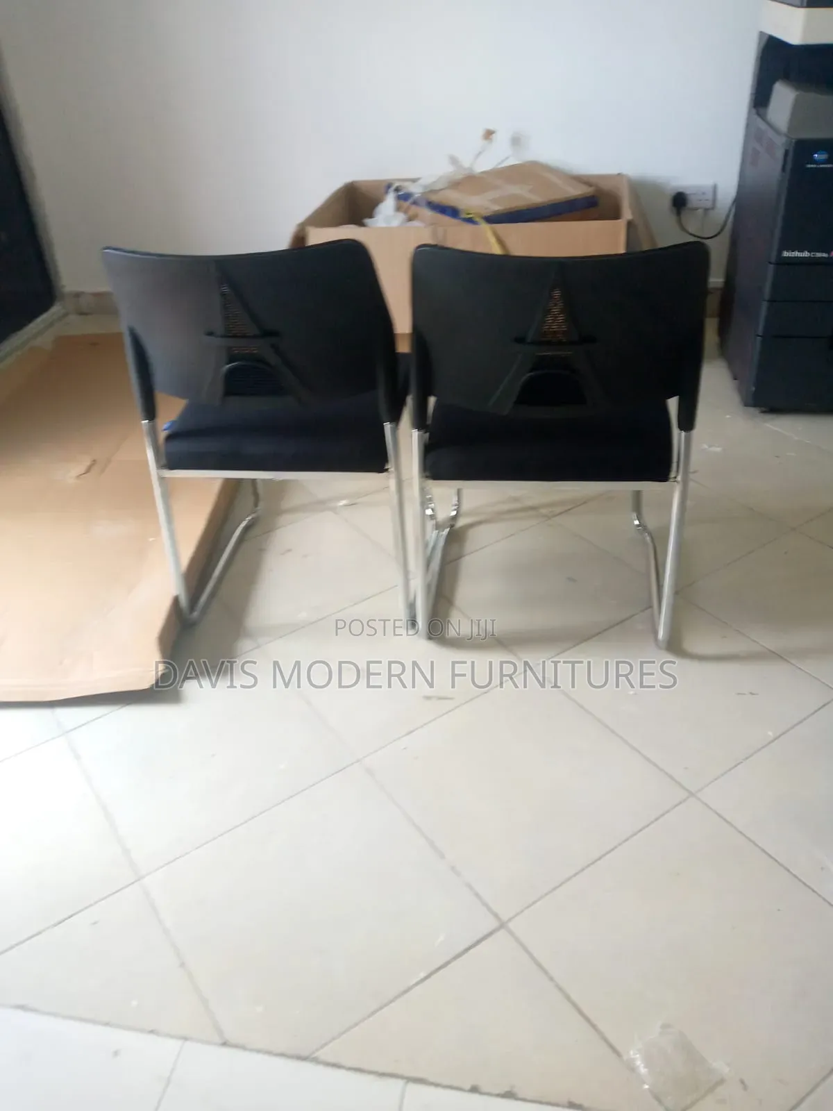 Pair of Black Cantilever Visitor Chairs With Mesh Backrests