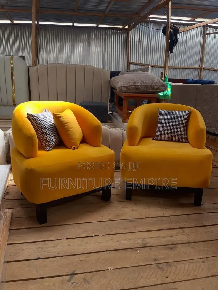 Vibrant Yellow Armchairs With Houndstooth Cushions